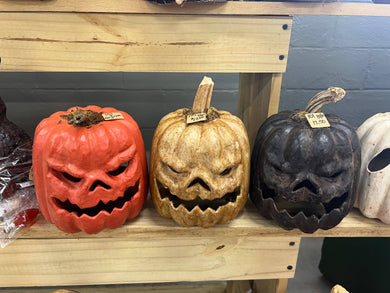 Carved Primitive Orange Grungy Halloween Jack O'Lantern pumpkin